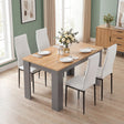 [4 Seater | White] Front view of a Grey & Pine 4-6 seater dining table with four white faux-leather chairs.