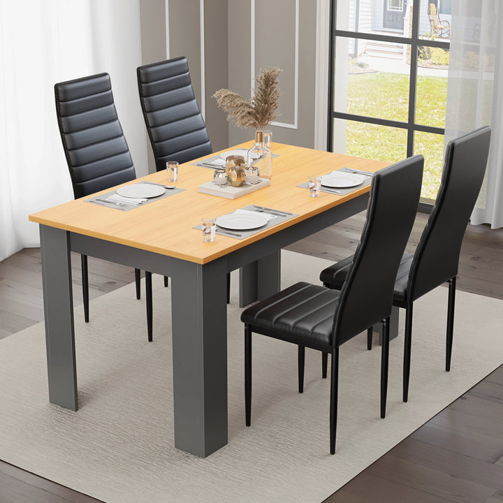[4 Seater | Black] dining scene with four black PU leather high back chairs around pine top table by window