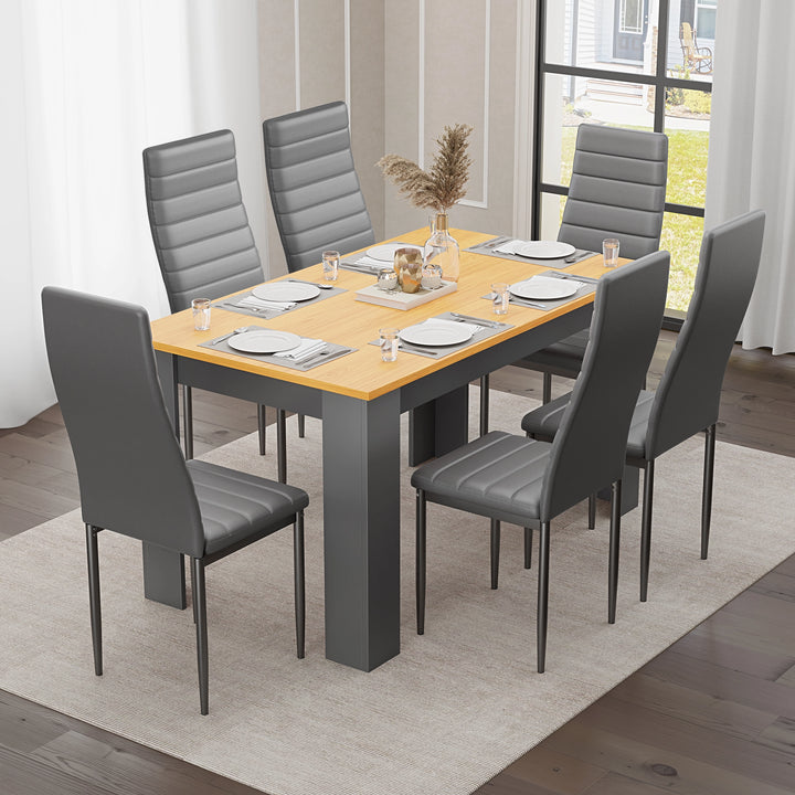 [6 Seater | Grey] lifestyle dining scene with 6 grey PU leather high back chairs around pine top table on woven rug