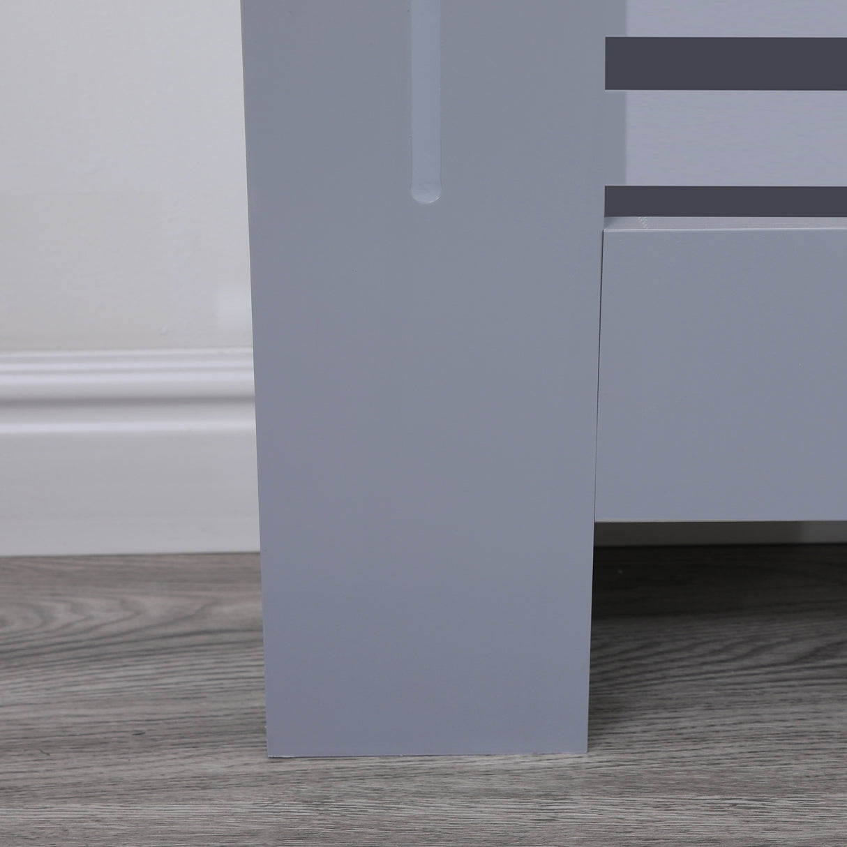 Grey radiator cover, providing a modern and elegant touch to any room.