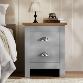 [Grey] shaker 2 drawer bedside table in grey with oak effect top silver cup handles beside cream bed