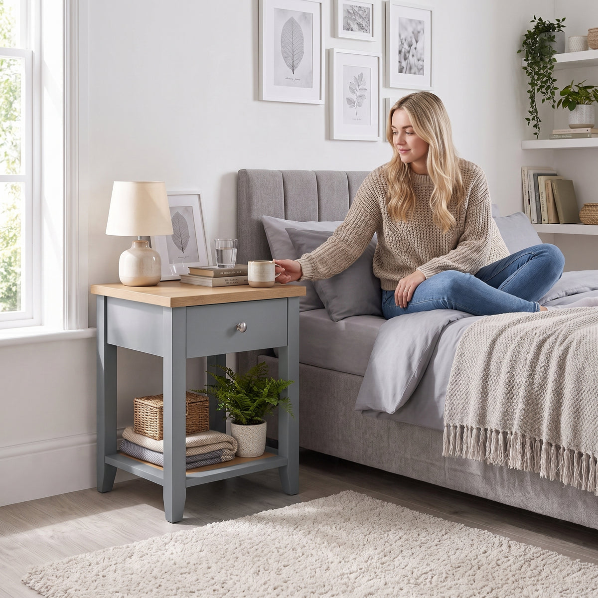 [Grey] Lifestyle view of Grey Shaker Bedside Table placed next to a modern upholstered bed.