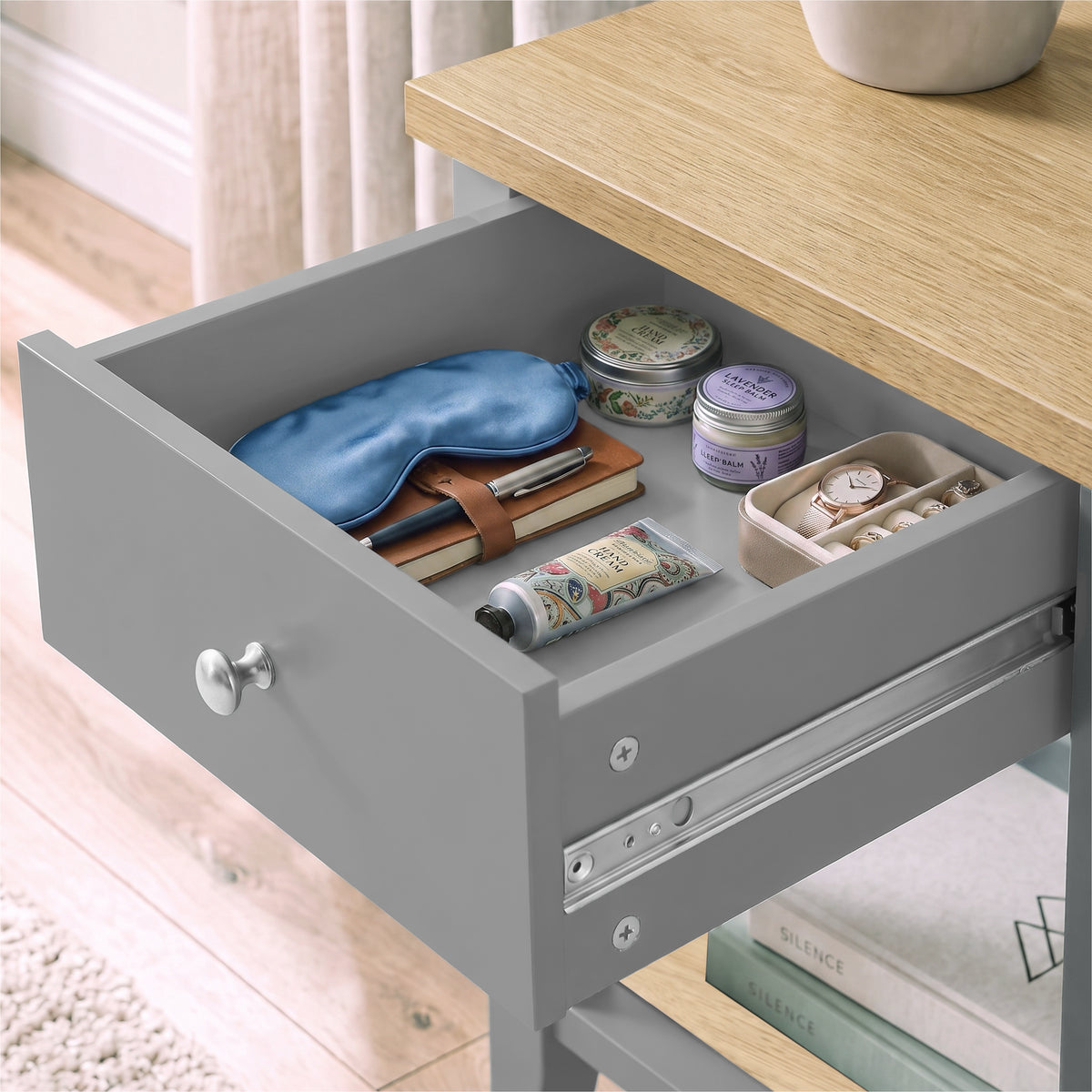 [Grey] Open drawer detail of Grey Shaker Bedside Table showing internal storage capacity.