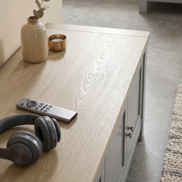 [Grey] Shaker TV unit 180cm oak effect top close-up with remote control and decorative items