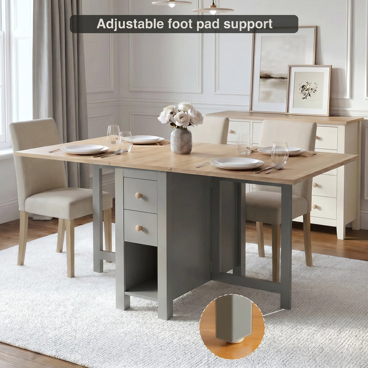 [Grey] Stovra Drop Leaf Dining Table extended with four upholstered chairs, adjustable foot pad detail inset