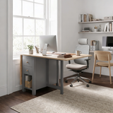 [Grey] Stovra Drop Leaf Dining Table used as a desk in a home office with monitor, plant, and drawers in use
