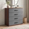 [Walnut] Grey and walnut 4-drawer chest with black handles styled against a white brick wall in a contemporary living room