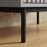 Grey wardrobe three door cabinet raised on black finish metal legs with sturdy lower frame construction