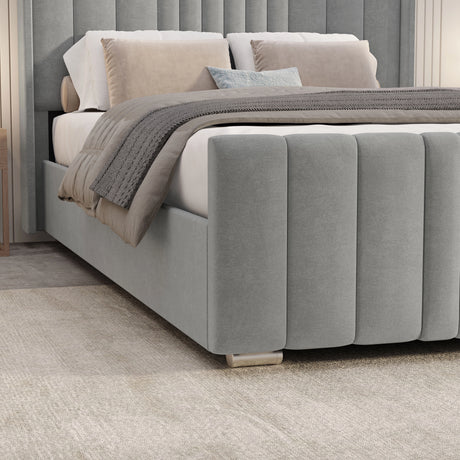Winged Ottoman Bed Frame with Lines in light grey velvet finish featuring vertical panel design and hidden under-bed storage for modern bedrooms.