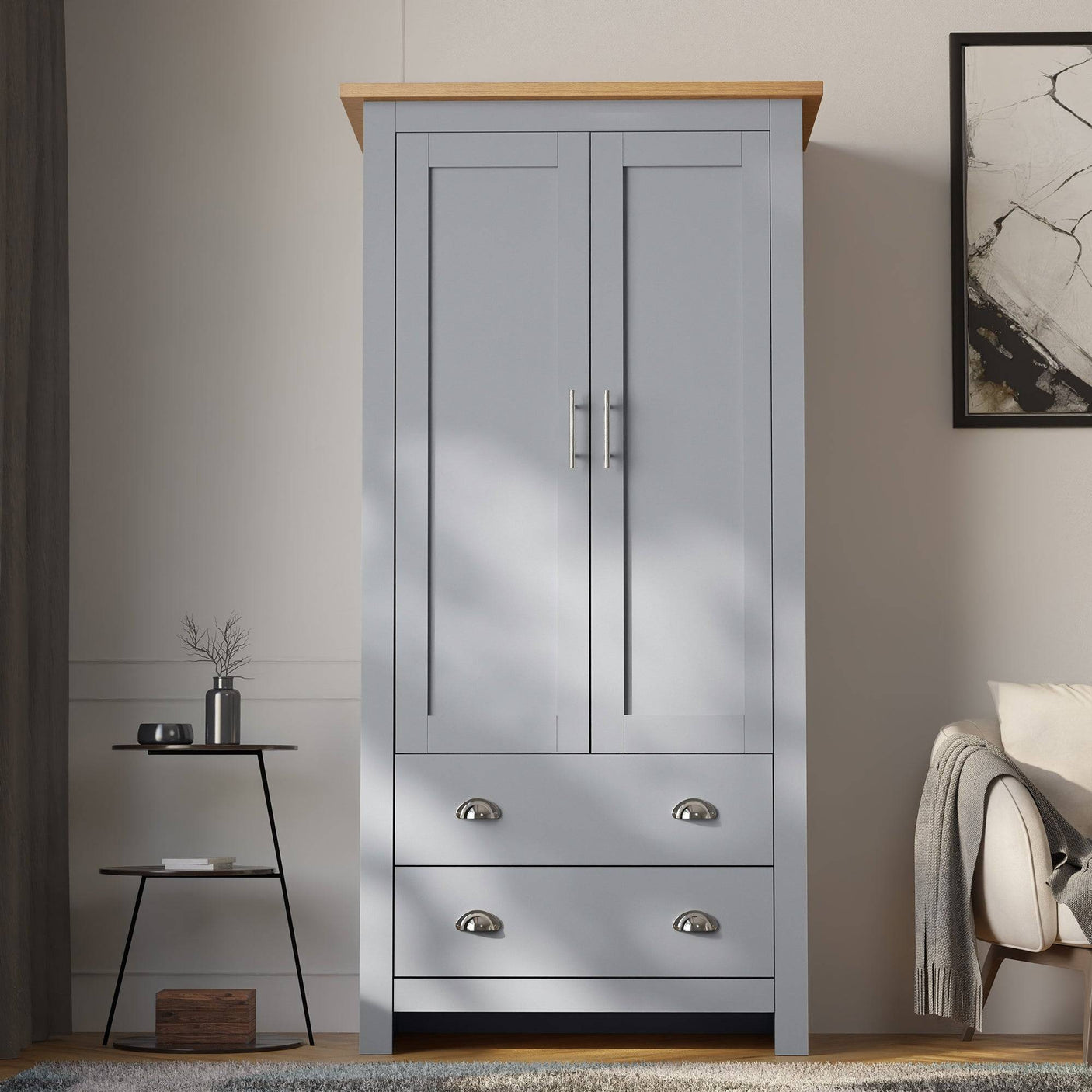 Grey wardrobe with sleek handles, perfect for organized storage of clothes and accessories.