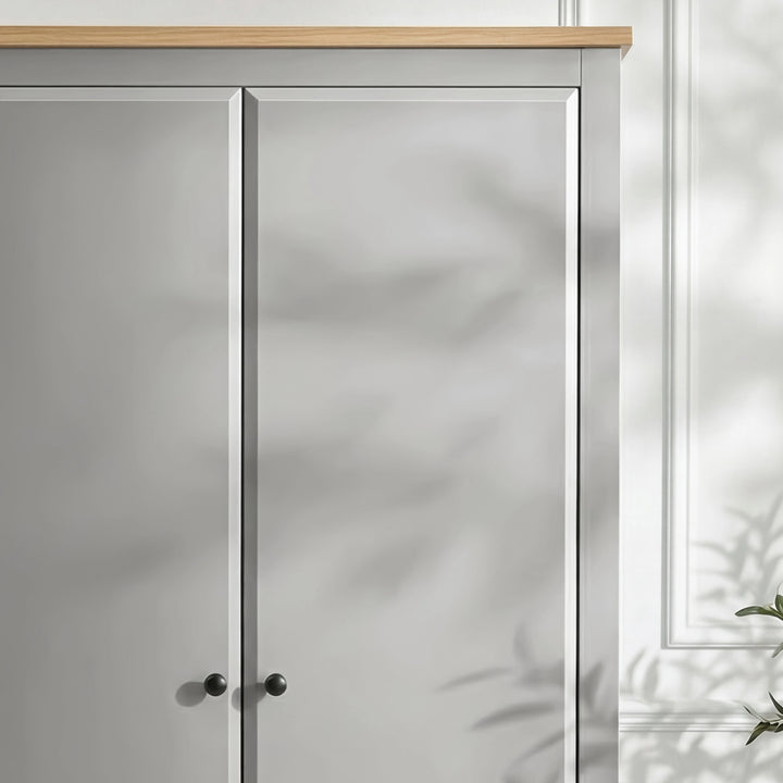 [Grey] Haven wardrobe close up, grey painted doors, oak top edge and round black knobs