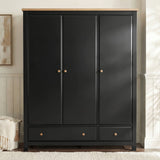 [Black] Haven wardrobe front lifestyle, painted doors with oak knobs beside panelled wall