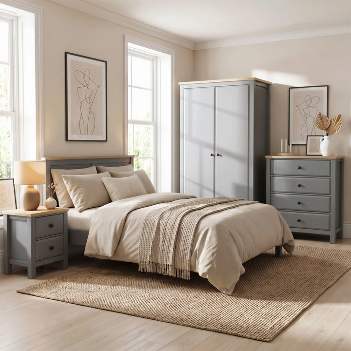 [Grey] Haven bedroom furniture set: 2-door wardrobe, 4-drawer chest and 2-drawer bedside, oak tops in a modern bedroom with natural light coming from windows