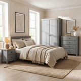 [Grey] Haven bedroom furniture set: 2-door wardrobe, 4-drawer chest and 2-drawer bedside, oak tops in a modern bedroom with natural light coming from windows