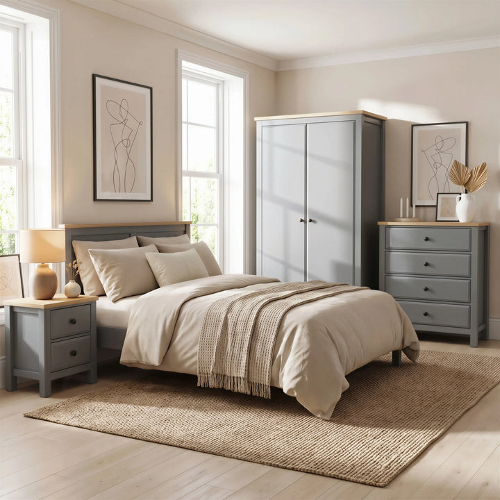 [Grey] Haven bedroom furniture set: 2-door wardrobe, 4-drawer chest and 2-drawer bedside, oak tops in a modern bedroom with natural light coming from windows