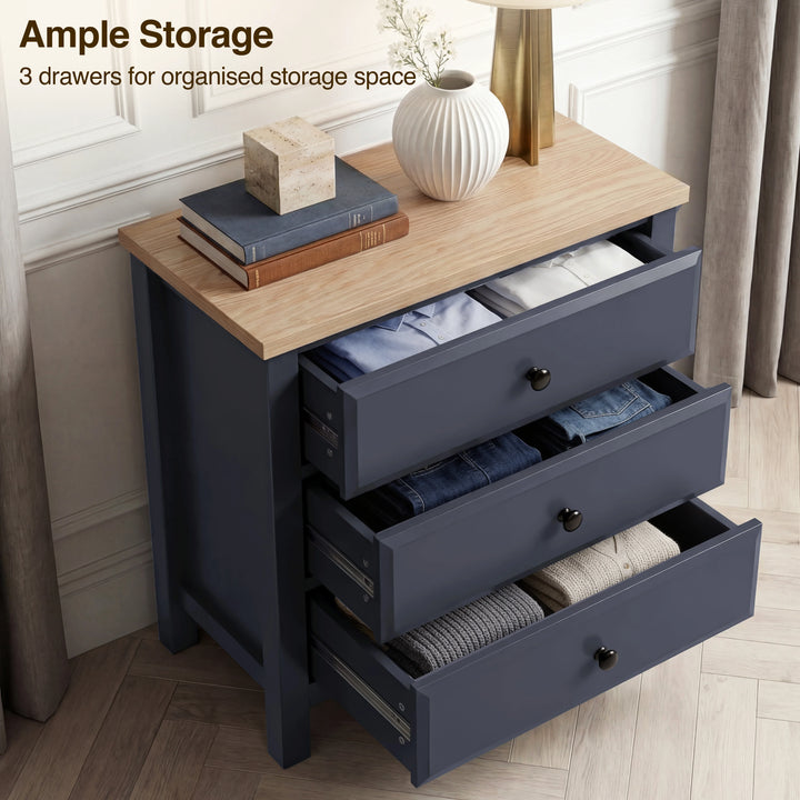 [Blue] Haven bedroom furniture set chest of drawers opened to display three equal-width drawers with oak top above