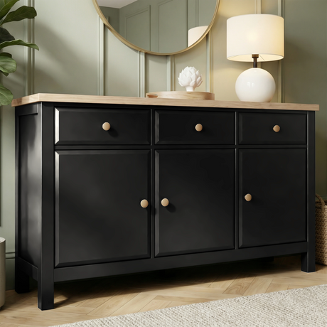 [Black] Haven 3-door sideboard front view on white background showing painted panel doors and oak veneer top