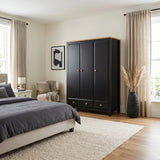 [Black] Haven Black Painted 3 Door Wardrobe with Drawers and Shelves styled inside a spacious modern bedroom.
