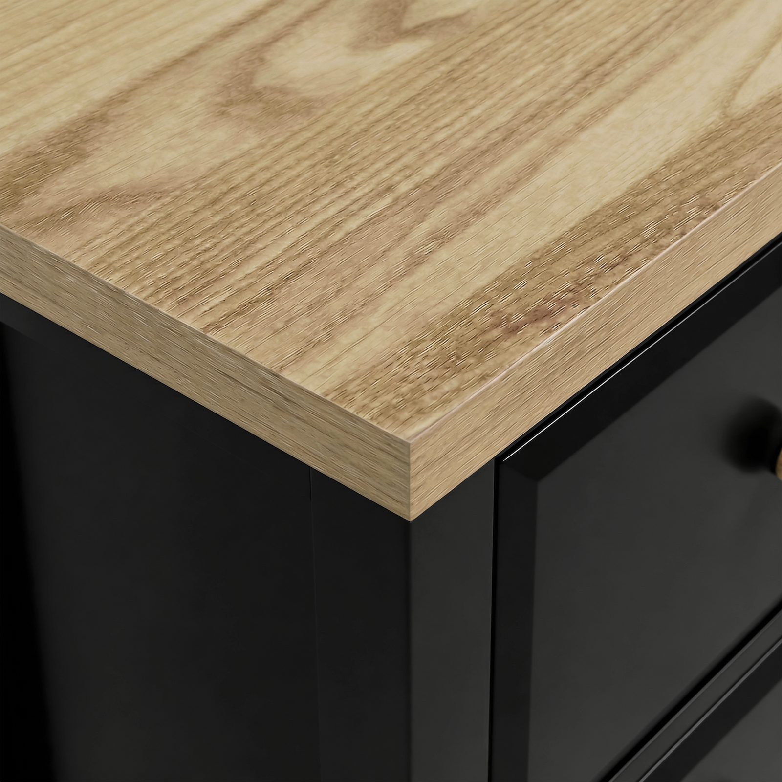 [Black] Haven 2-drawer bedside table close-up of the oak veneer top surface showing natural wood grain texture