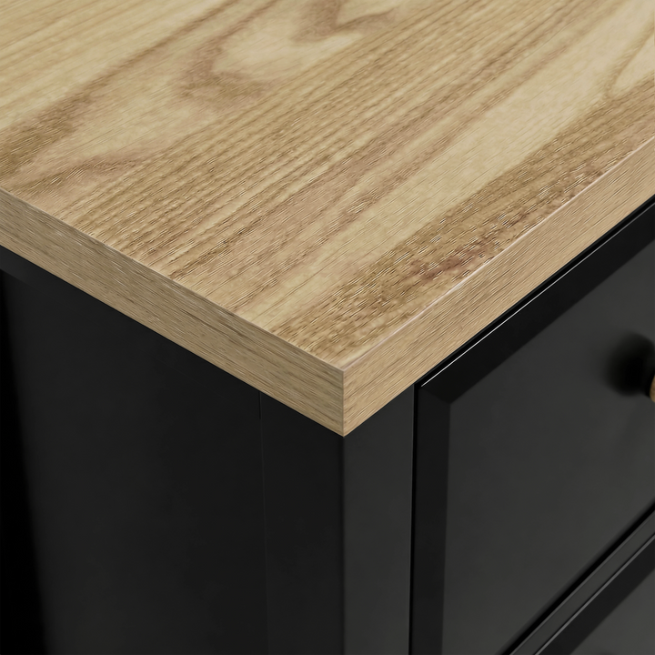 [Black] Haven 2-drawer bedside table close-up of the oak veneer top surface showing natural wood grain texture
