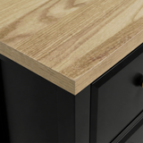 [Black] Haven 2-drawer bedside table close-up of the oak veneer top surface showing natural wood grain texture