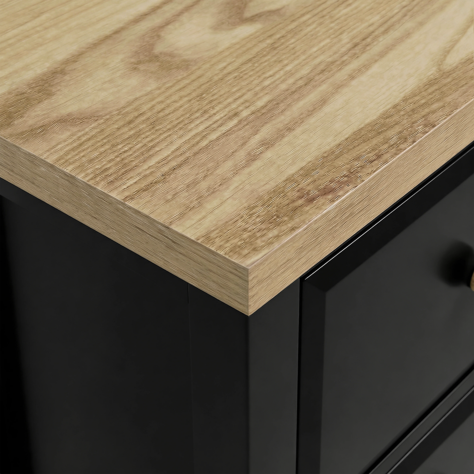 [Black] Haven 2-drawer bedside table close-up of the oak veneer top surface showing natural wood grain texture
