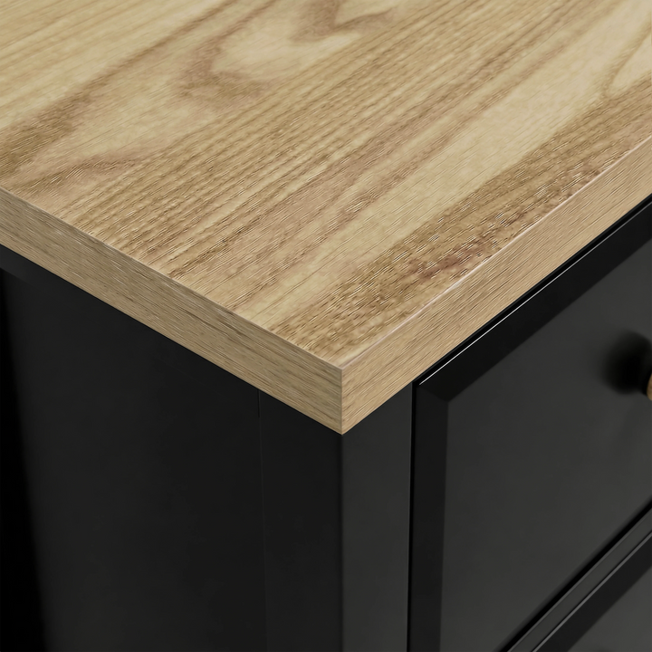 [Black] Haven 2-drawer bedside table close-up of the oak veneer top surface showing natural wood grain texture