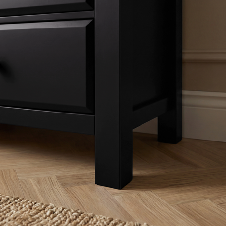 [Black] Haven chest of drawers angled side profile showing painted frame depth and oak veneer top edge detail