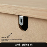 [Black] Haven 5-drawer tall chest detail showing anti-tip wall safety bracket and oak veneer top edge close-up