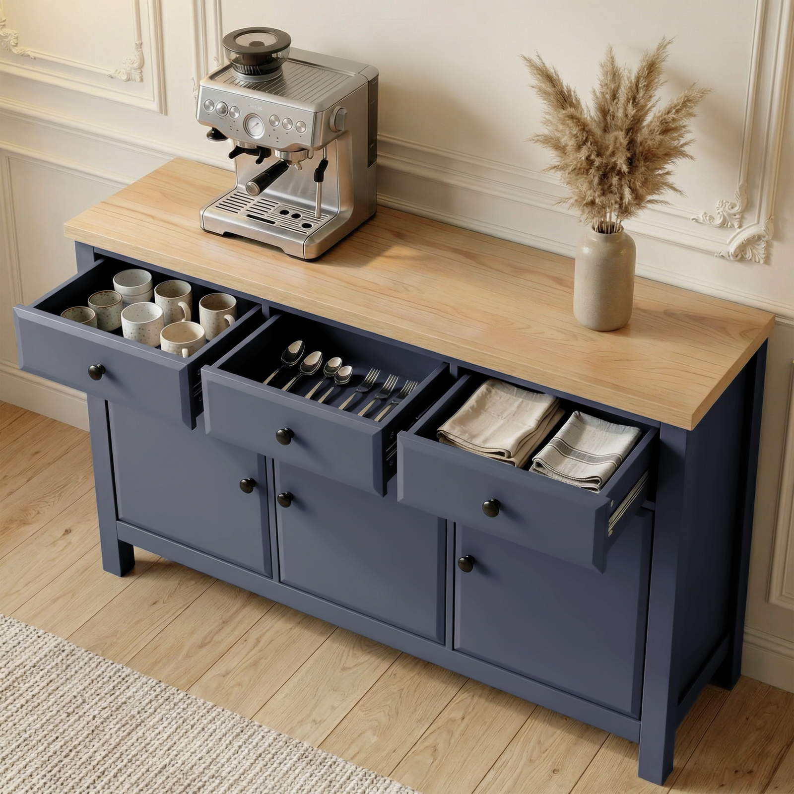 [Blue] Haven 3-door sideboard with all three top drawers pulled open showing utensils and tea towels inside