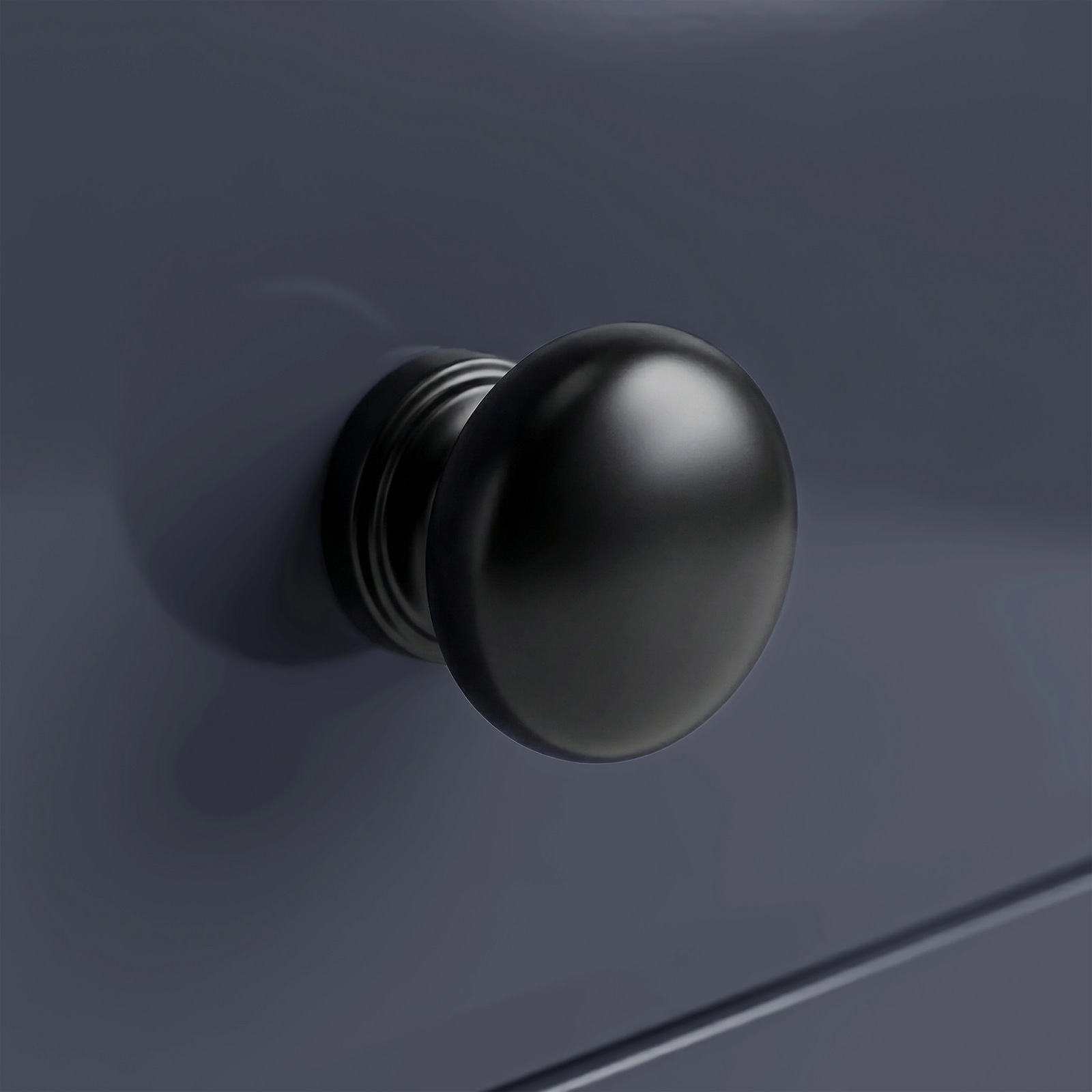 [Blue] Haven 3-drawer chest close-up of one square tapered painted leg meeting the floor on light wood planks