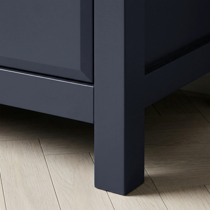 [Blue] Haven 3-drawer chest handle detail showing one round black knob protruding from a blue painted drawer