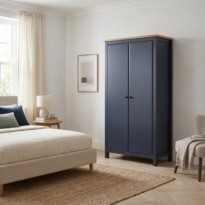 [Blue] Haven Blue 2 Door Double Wardrobe with Shelves and Hanging Rail closed view in a bright bedroom setting.