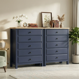 [Blue] Haven 5-drawer tall chest beside a second matching tall chest with oak tops styled with framed art and books