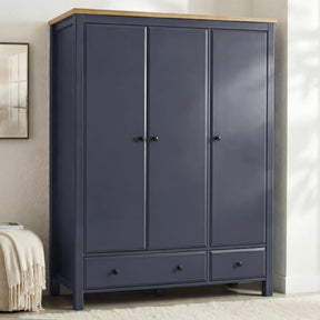 [Blue] Haven 3-door wardrobe front view in a bedroom setting with soft natural light across the closed panel doors
