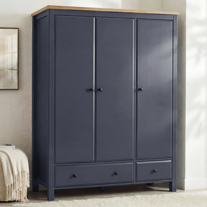 [Blue] Haven 3-door wardrobe front view in a bedroom setting with soft natural light across the closed panel doors