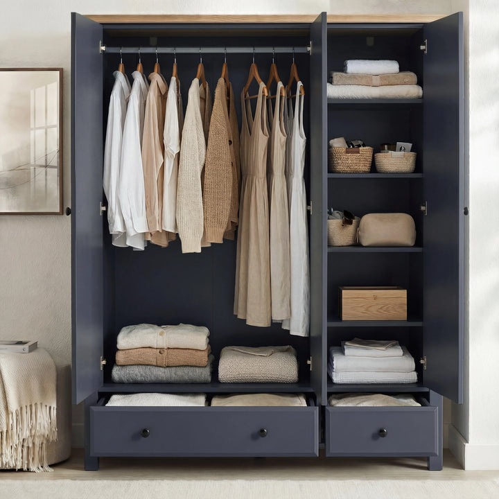 [Blue] Haven 3-door wardrobe fully open showing hanging rail with clothes and shelves with folded items inside