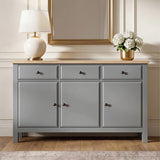 [Grey] Haven 3-door sideboard front view in a styled room with decorative objects arranged on oak veneer top