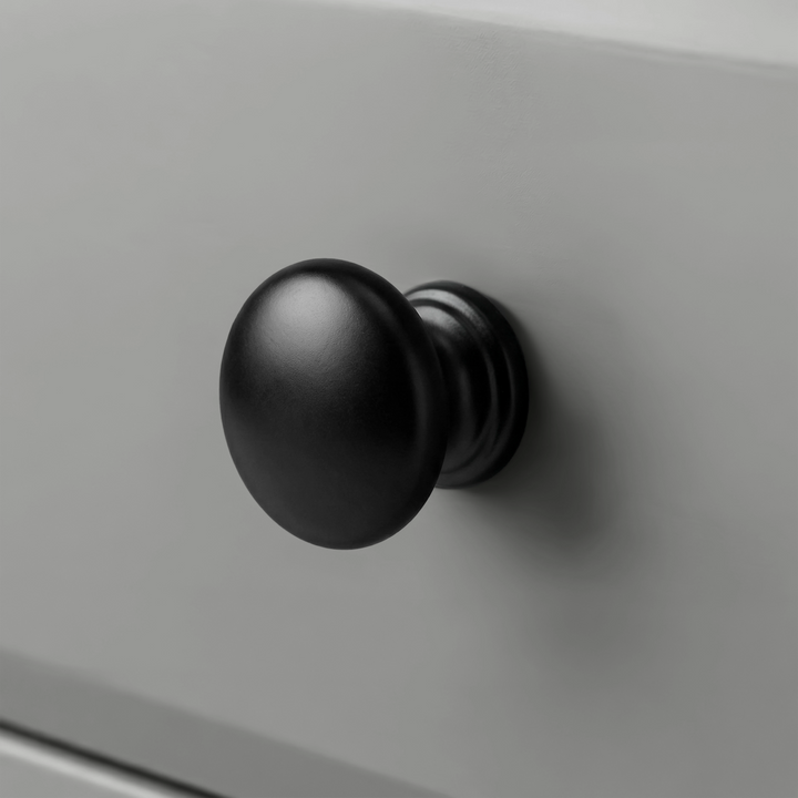 [Grey] Haven 3-drawer chest close-up of matte black round knob with stepped ring collar on grey drawer front