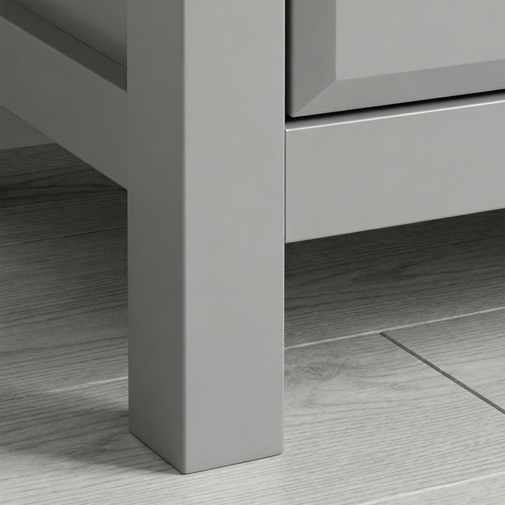 [Grey] Haven chest of drawers tight detail of one tapered leg meeting the painted frame at a corner joint