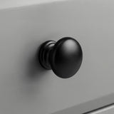 [Grey] Haven 6-drawer chest round black knob handle close-up with stepped collar on grey painted drawer front