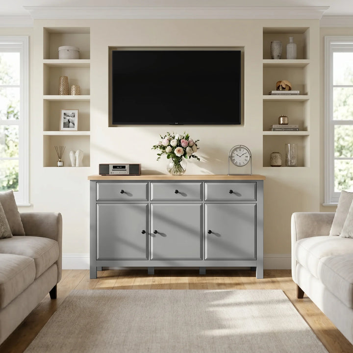 [Grey] Haven Large Black Sideboard with Drawers & Oak Top used as a console below a wall TV.