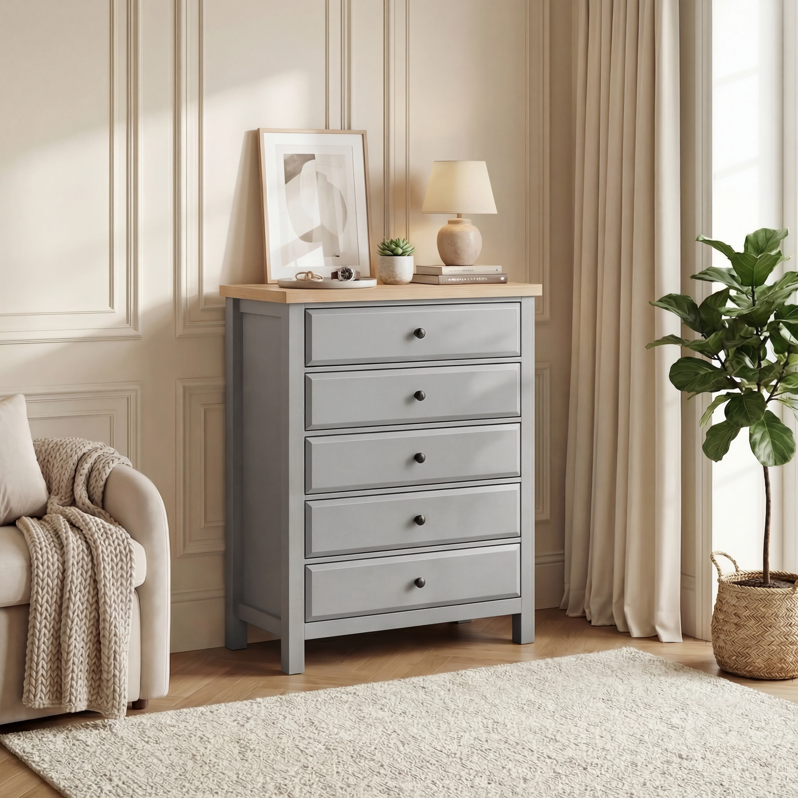 [Grey] Haven tall chest of drawers in a bedroom with framed picture and lit table lamp on oak top