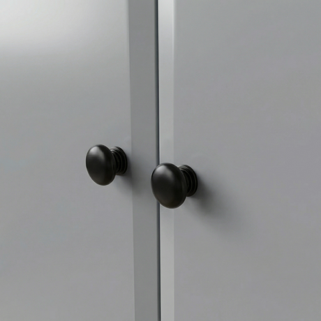 [Grey] Haven 3-door wardrobe close-up of two round solid black wooden knob handles on painted door fronts