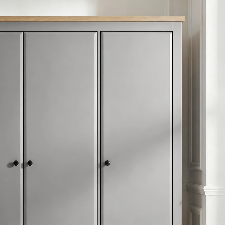 [Grey] Haven 3-door wardrobe angled close-up of top right corner showing oak veneer top panel and door frame