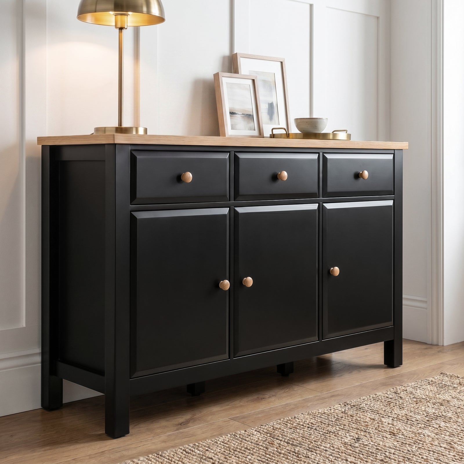 [Black] Haven Large Black Sideboard with Drawers & Oak Top, Painted Finish shown from an elegant low angle.