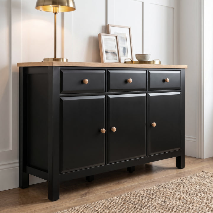 [Black] Haven Large Black Sideboard with Drawers & Oak Top, Painted Finish shown from an elegant low angle.