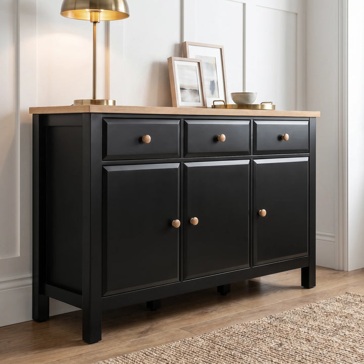 [Black] Haven Large Black Sideboard with Drawers & Oak Top, Painted Finish shown from an elegant low angle.