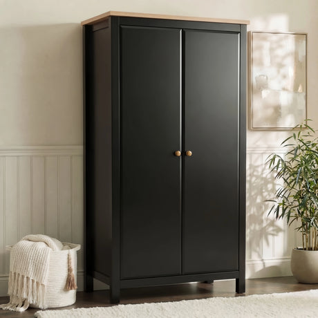 [Black] Haven 2 door wardrobe, matte black frame with oak top, round knobs, beside a woven basket.