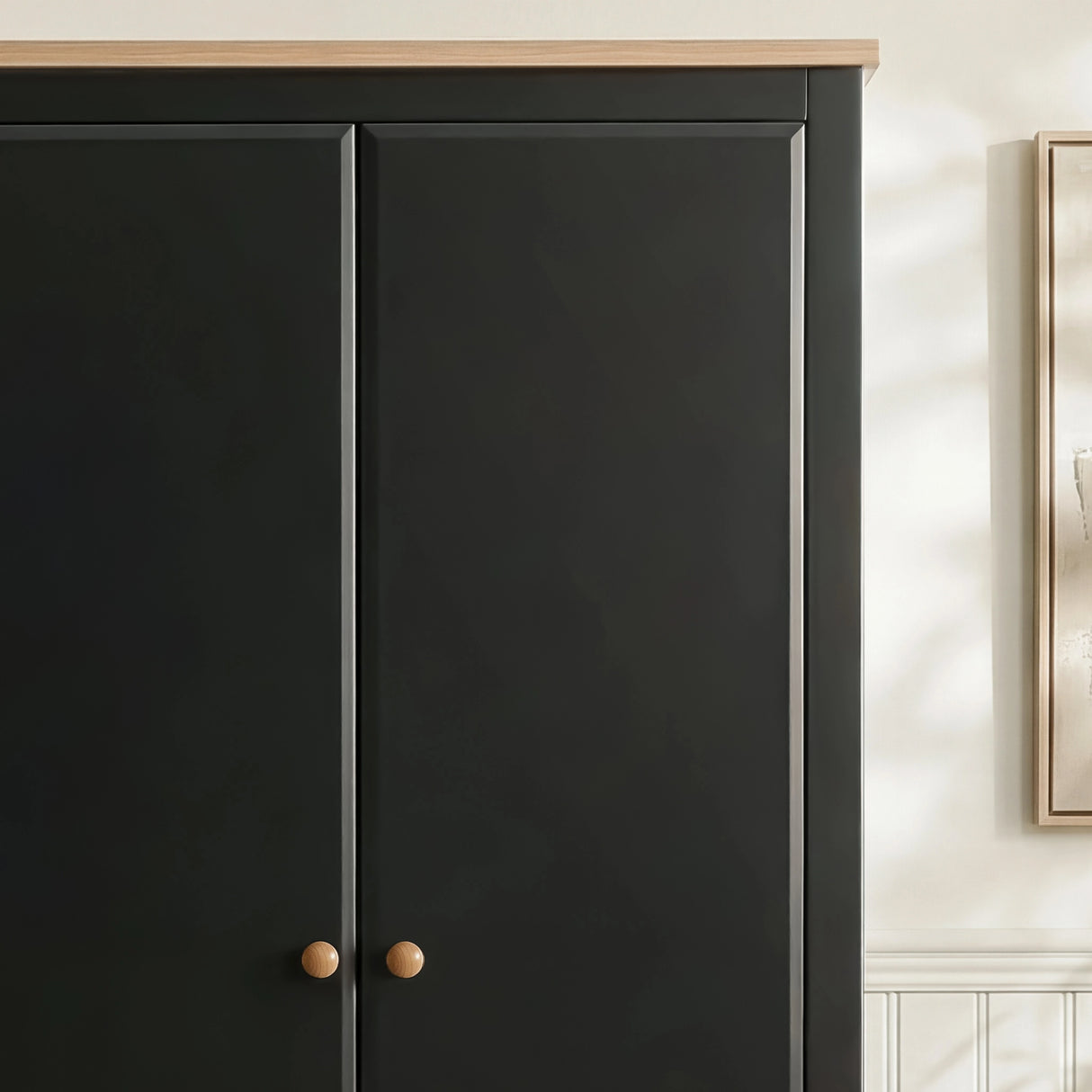 [Black] Haven 2 door wardrobe top corner, oak veneer crown sitting proud of the matte black frame.